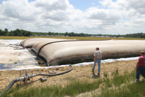 Sludge bags in the field